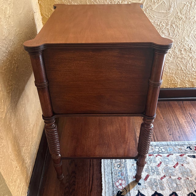 Ethan Allen Newport Night table with asymmetrical spiral leg posts, two drawers and an open fixed shelf below....
