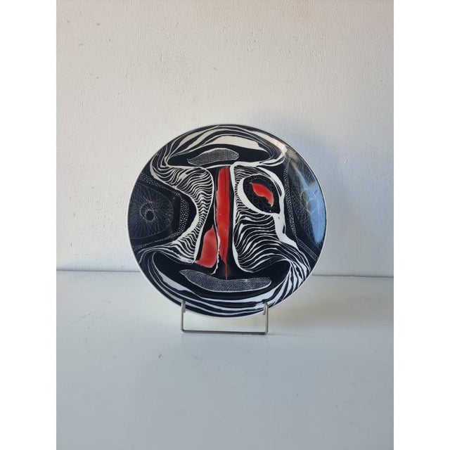 Hanna Modrzewska Nowosielska, decorative plate, 1960s, diameter: 26 cm. Signed on the back: "H. Modrzewska UNIKAT"...
