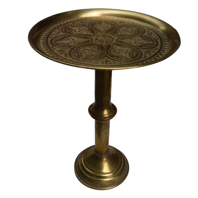 Antique highly crafted, engraved and detailed Moroccan tray table. Constructed of solid brass and hand-engraved with...