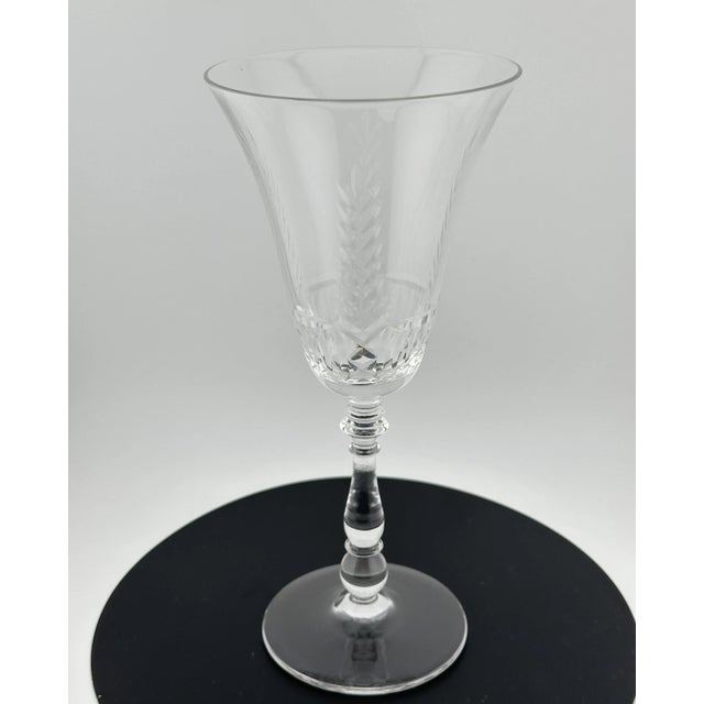 Set of four vintage Bryce crystal water goblets, featuring a graceful vertical feather cut pattern on clear crystal. Each...