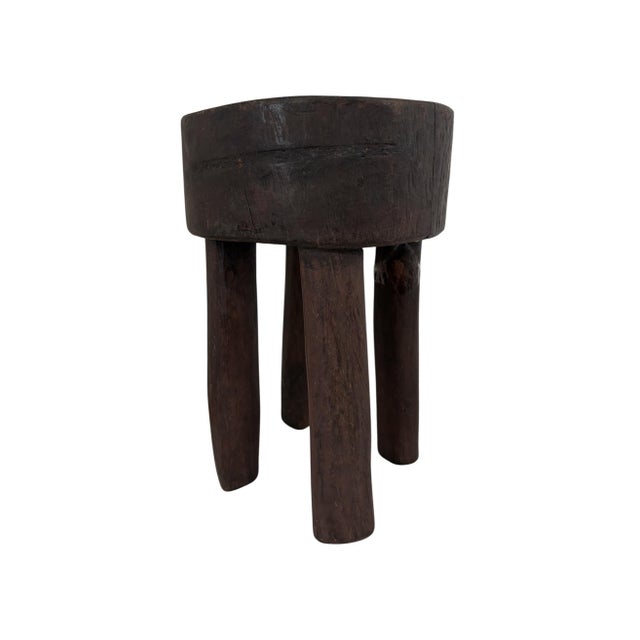 This stunning and rare vintage African wooden milk stool, skillfully crafted by the Hehe Gogo people in Tanzania from a...