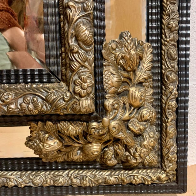 Wood Large Continental Brass Repoussé and Ebonized Crested Cushion Mirror For Sale - Image 7 of 8
