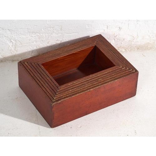 This set of antique Japanese stacking storage boxes consists of seven modular pieces crafted in solid stained wood,...