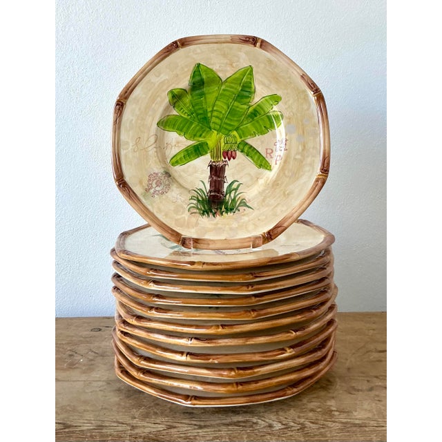 This exceptional set of fifteen vintage ceramic dinner plates is a masterful celebration of 1980s Hollywood Regency and...