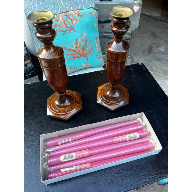Up for consideration is a beautiful vintage pair of wooden candlestick holders and collection of pink candles. These would...