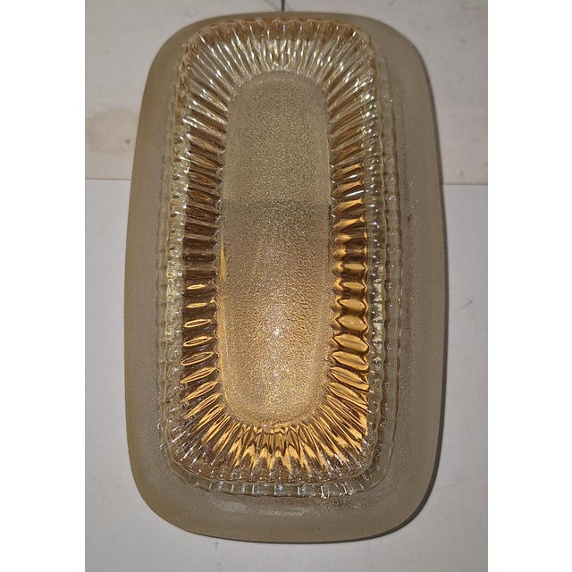 Vintage Wall Lamp with Metal Mounting and Lightly Tinted Relief Glass Shade, 1960s, in Very Good conditions. Designed 1960...