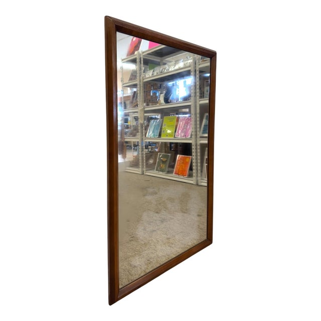 This authentic Mid-Century Modern wall mirror was produced in Virginia by the Galax Mirror Company, featuring its original...
