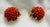 Elegant and collectible, these vintage Nettie Rosenstein clip-on earrings feature striking clusters of petite red coral...