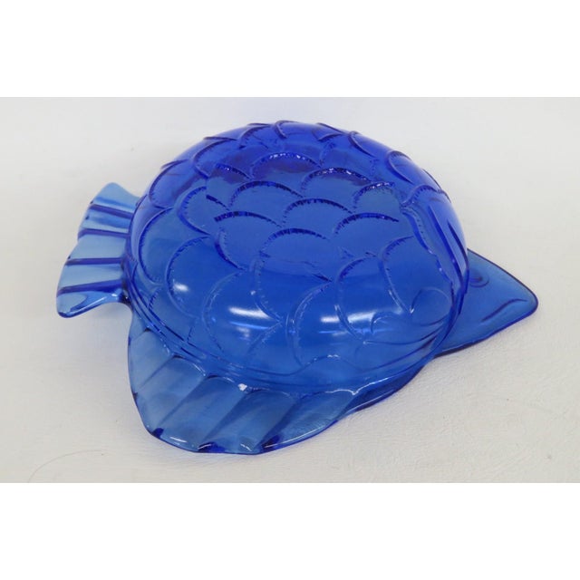 This lovely Angel Fish Ashtray is made of glass. This charming ashtray is in the shape of an angel fish with lovely scale...