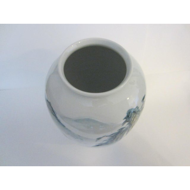 A midnight blue on white Porcelain baluster style vase inspiring Japanese scenic, outdoor landscape, mountain, trees,...