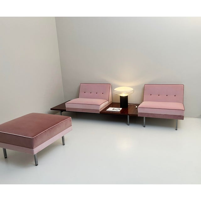 Modular living room produced by Formanova in the 1970s, composed of an armchair with two inserted tables, an armchair, a...