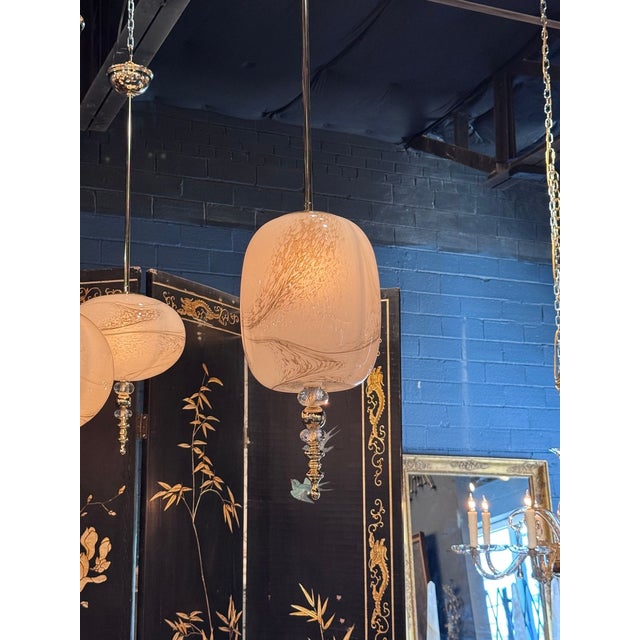 The Murano Swirl Glass Lanterns are elegant lighting fixtures designed for the any indoor space. Creates a very warm...
