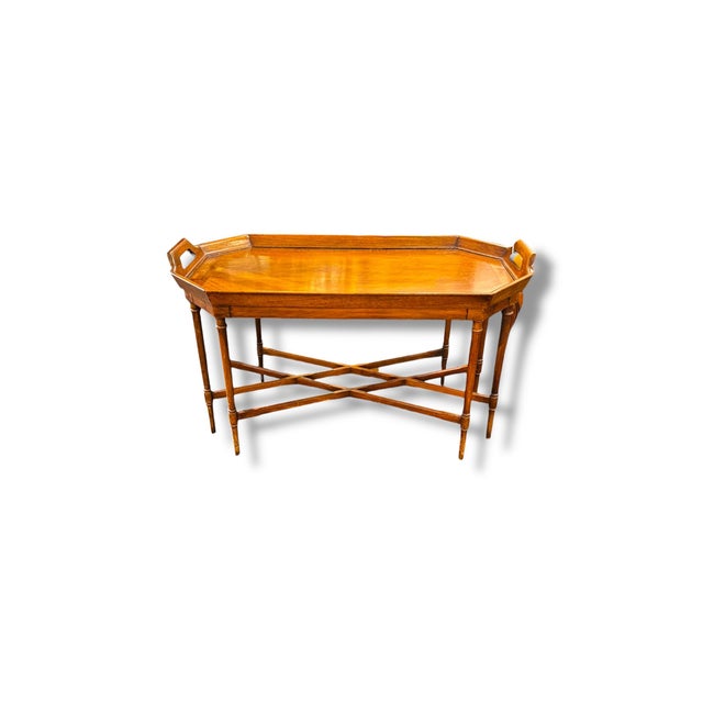 This vintage tray-top console table blends timeless craftsmanship with versatile functionality. Featuring a beautifully...