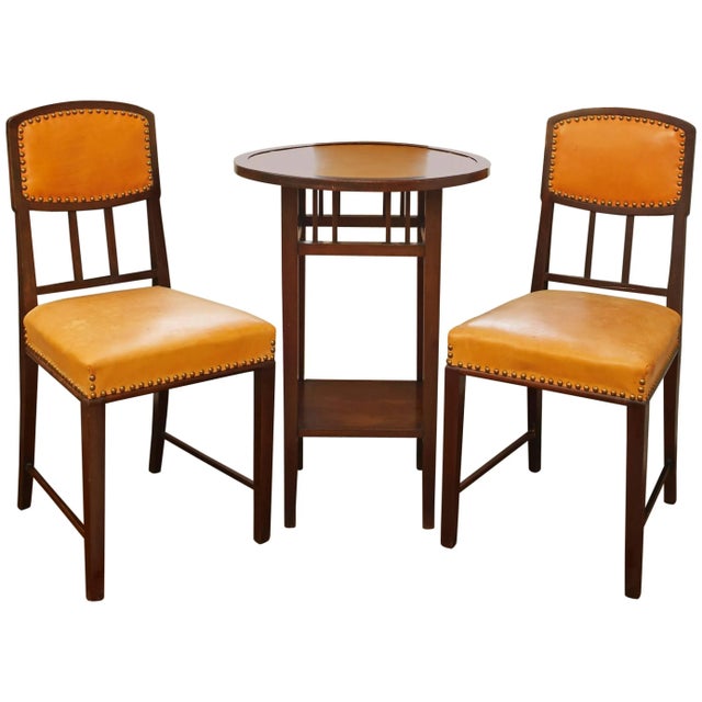 Rare Brazilian Jacaranda two chairs and table Art Nouveau set, circa 1900. Mission arts and crafts design. Table height:...