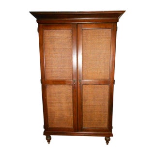 Wooden Armoire With Cane Panels For Sale