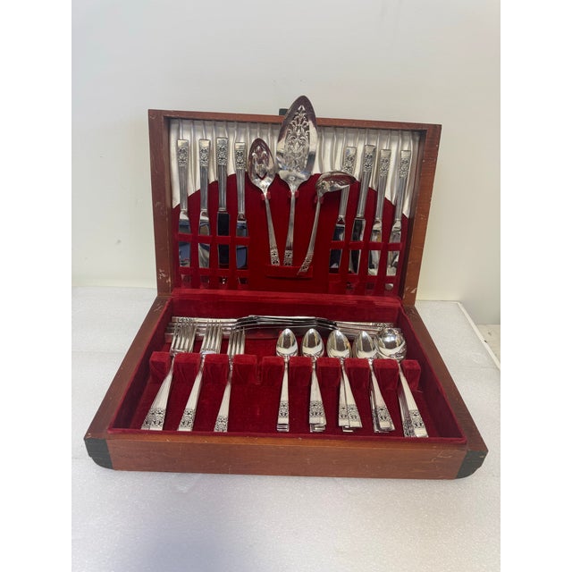 Set of large quantity of silver plated Oneida Community "Coronation" silverplate flatware pattern, introduced in 1936. The...