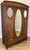 This elegant Antique French wardrobe features a beautifully proportioned design with decorative carved details, polished...
