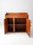This is an antique beadboard dry sink. The primitive cabinet features a tall backsplash with two door openings to a shelf...