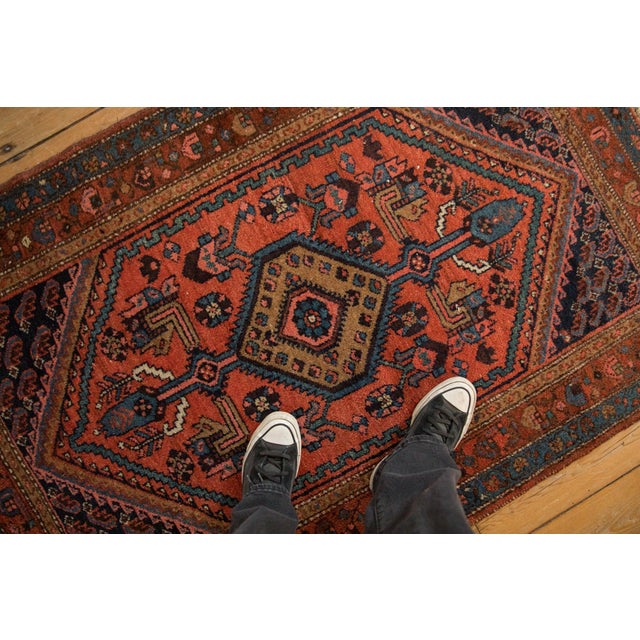 :: Hexagonal center medallion with sharp serrated contour adorned by long stemmed cypress tree finials atop a covered...