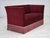 1970s, Danish 2-seater sofa. Original cherry-red furniture velour, dark beech wood legs, springs in the seat. Original...