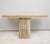 Sculptural Pair of Contemporary Italian Travertine Consoles with Brass Banding. Set of 2. Measurements are for each...