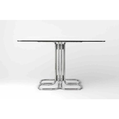 Mid-century table with fumé glass top and tubular steel base in Hollywood Regency Style. Attributed to Giotto Stoppino and...