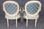 This elegant suite of Louis XVI-style dining chairs presents a refined combination of painted wood, restrained parcel-gilt...