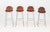 Charlotte Perriand (French, 1903-1999) Set of Four &nbsp;"Les Arcs" Bar Stools, brown leather seats on chrome-plated...