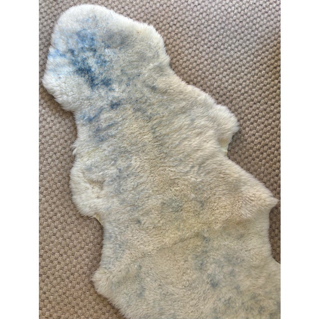 White blue-tipped sheep skin accent throw, circa 1960s. No maker's mark. A luxurious accent piece and great for draping...
