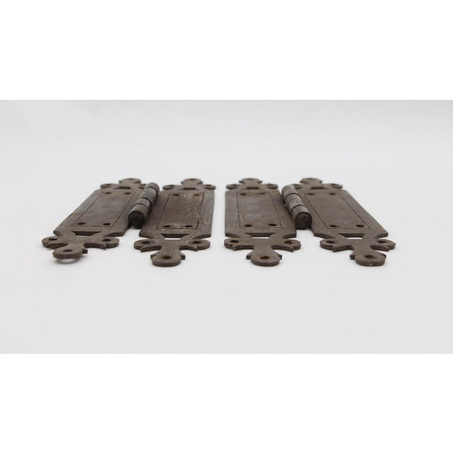 These textured Arts & Crafts style surface door hinges are made of steel with five knuckles. The original mounting screws...