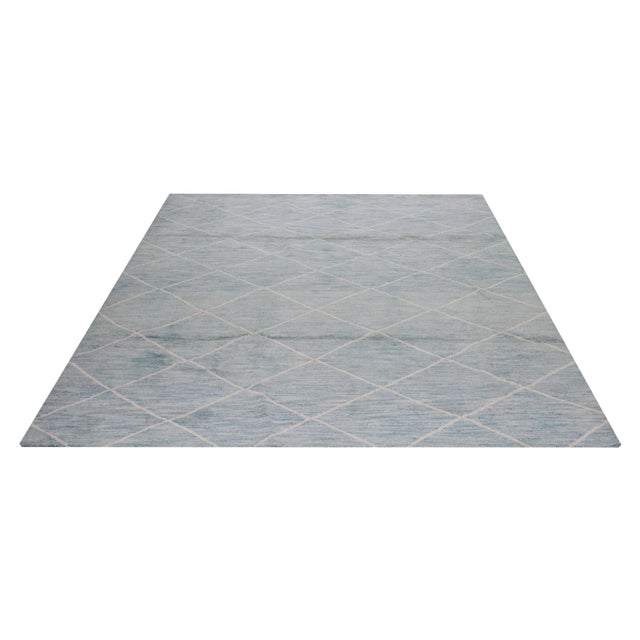 Moroccan Beni Ourain hand knotted rug with natural colors, contemporary style and soft texture.
