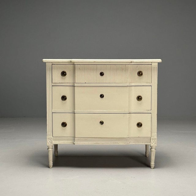 Gustavian, Swedish Commode, Louis XVI Style, White Paint Distressed, Sweden, 1990s Louis XVI style dresser or cabinet...