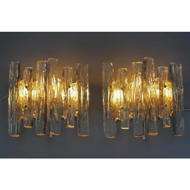 An impressive pair of Mid-Century Modern icicle ice glass wall sconces made by Kalmar, Franken KG, Austria, circa in the...