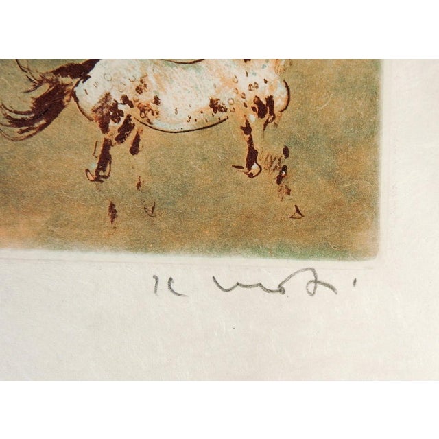Late 20th century aquatint etching on handmade paper of horses in shades of umber and blue by Kaiko Moti (1921 - 1989)...