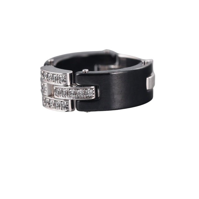 Vintage 18 K White Gold Cartier Maillon Panthère Black Ceramic and Diamond Cocktail Ring. The bold architectural design...