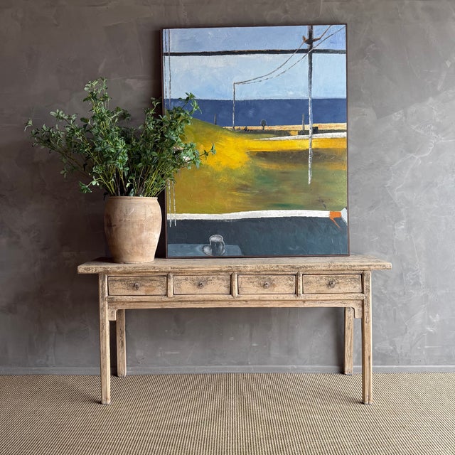 This charming vintage elm wood console is a one-of-a-kind piece with beautiful age and patina that adds character to any...