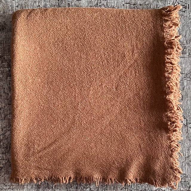Cozy up with this soft throw imported from Pairs, France. Virgin wool is simply wool that’s never been used before. It’s...
