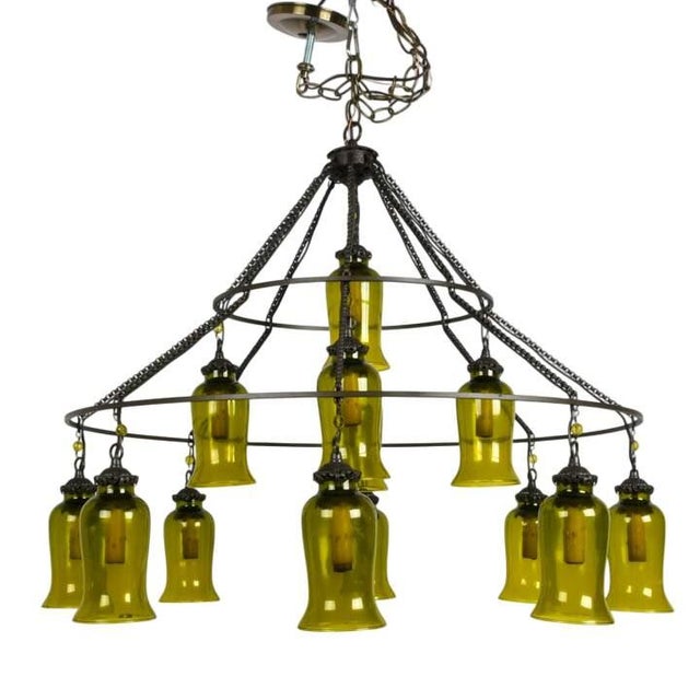 Bringing the warmth and romance of Mediterranean architecture into the home, this striking Spanish Revival chandelier...