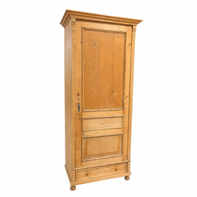 Design Plus Gallery presents a Traditional Pine Single-Door Armoire. Constructed from solid pine, the cabinet displays...