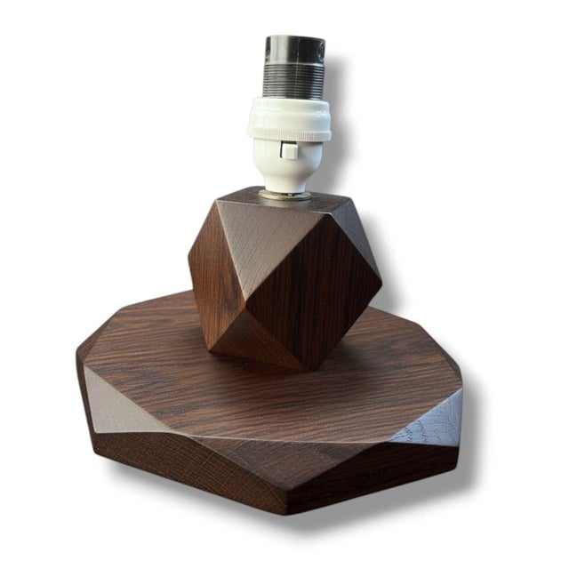 This antique oak table lamp by Heal’s of London is a rare, sculptural lighting piece from the 1920s that brings timeless...