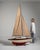 This 1960s model from France is finished in ivory, worked in wood. Its form follows honest, well-proportioned lines...