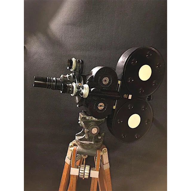 Submitted for your consideration is this Bell & Howell Eyemo 35mm motion picture camera, model 71-Q, complete with manual...