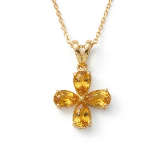 Citrine Floral Pendant Necklace This elegant pendant necklace showcases the radiant beauty of citrine gemstones, arranged...