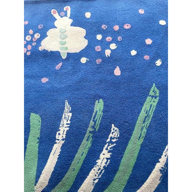 A distinctive vintage tisca “sophie” rug, hand-tufted in france in the 1990s from 100% new zealand wool . The rug features...