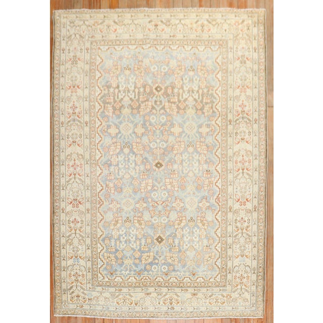 An accent size early 20th century Persian Malayer rug in predominantly light blue Measures: 4'6" x 6'1".