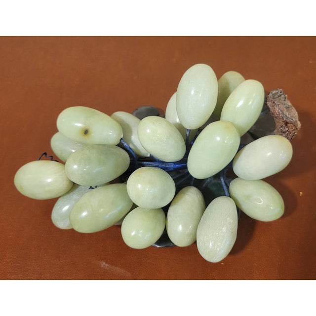 This Vintage MCM Stone Green Grape Cluster & Leaves is a true collector's item. The large grape cluster is made of...