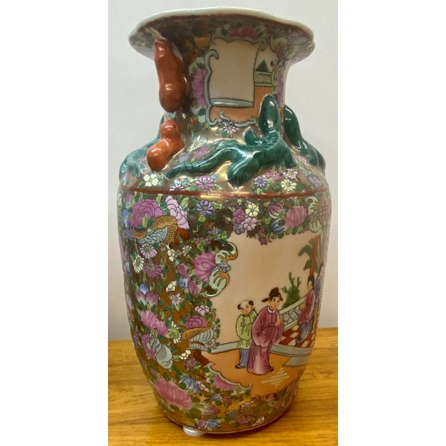 Pair of Early 20th Century Chinese Porcelain Vases Beautiful hand painted vases with flowers, figures and different...