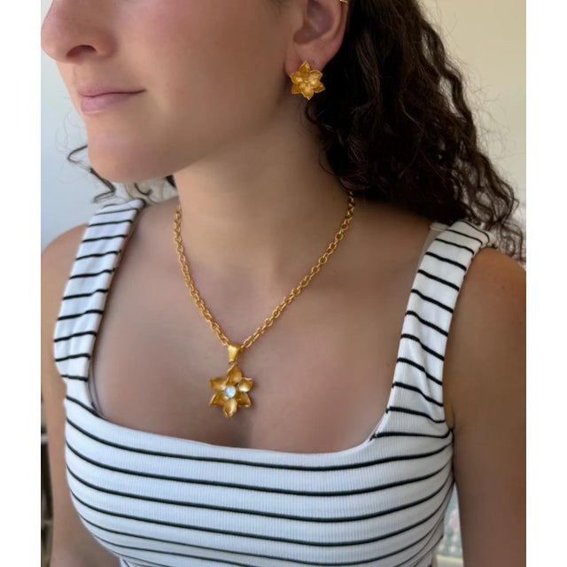 Rich 18k gold plated magnolia blooms. Ear post