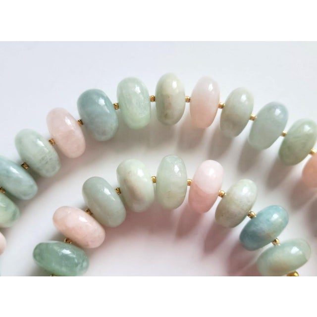 The length of the necklace is 19 inches (48 cm). The size of the rondelle beads is 16.5 mm. The color of the beads is a...