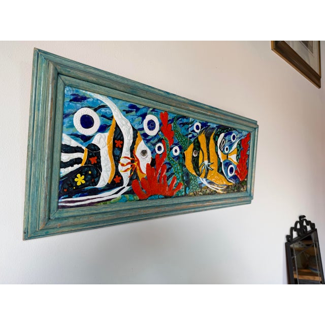 Striking vintage handmade wall-mounted mosaic featuring a vibrant underwater scene with tropical fish, coral, and abstract...